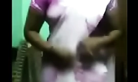 Indian aunty removing her saree