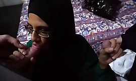 Arab babe at hand glasses sucks two cocks for money